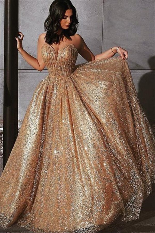 Champagne Elgant A-line Spaghetti Straps Backless Sequins Long Prom Dress